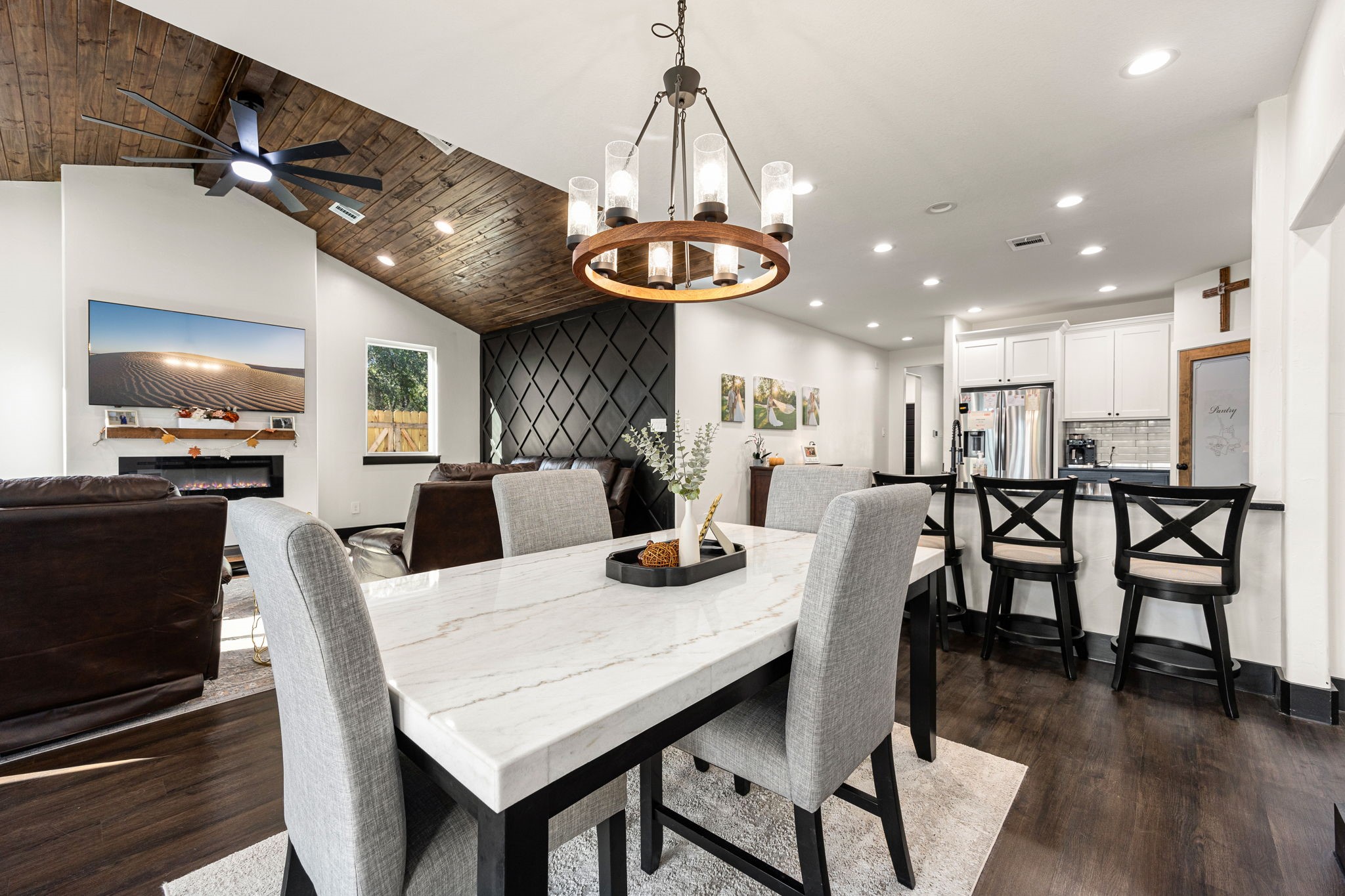 24571 Armagh Road Hempstead, TX 77445 - Photo 22 of 45 a view of a dining room with furniture wooden floor and chandelier