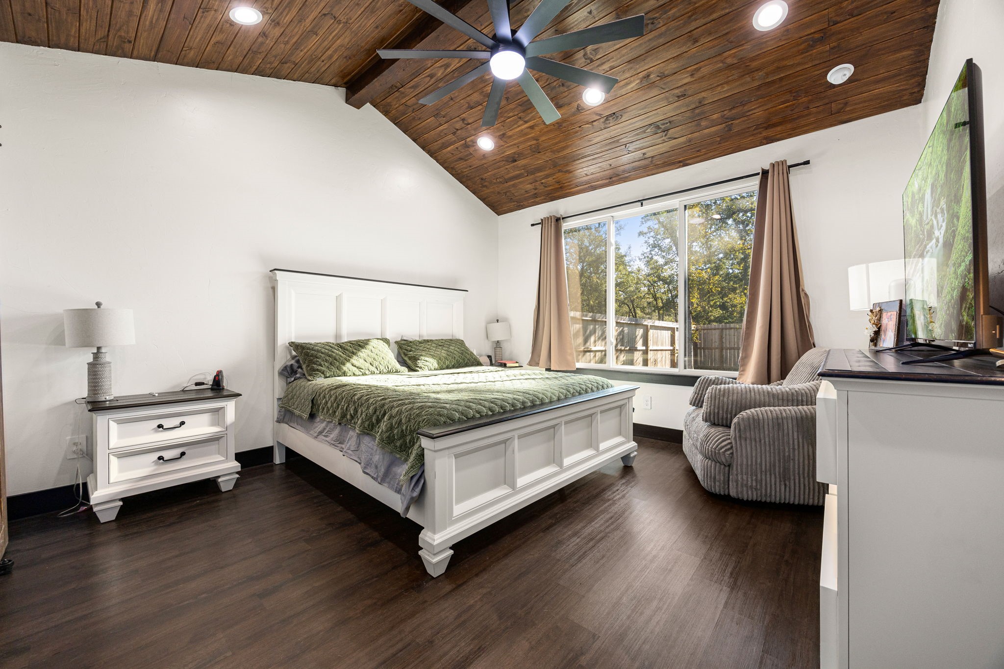 24571 Armagh Road Hempstead, TX 77445 - Photo 23 of 45 a bedroom with a bed and a couch