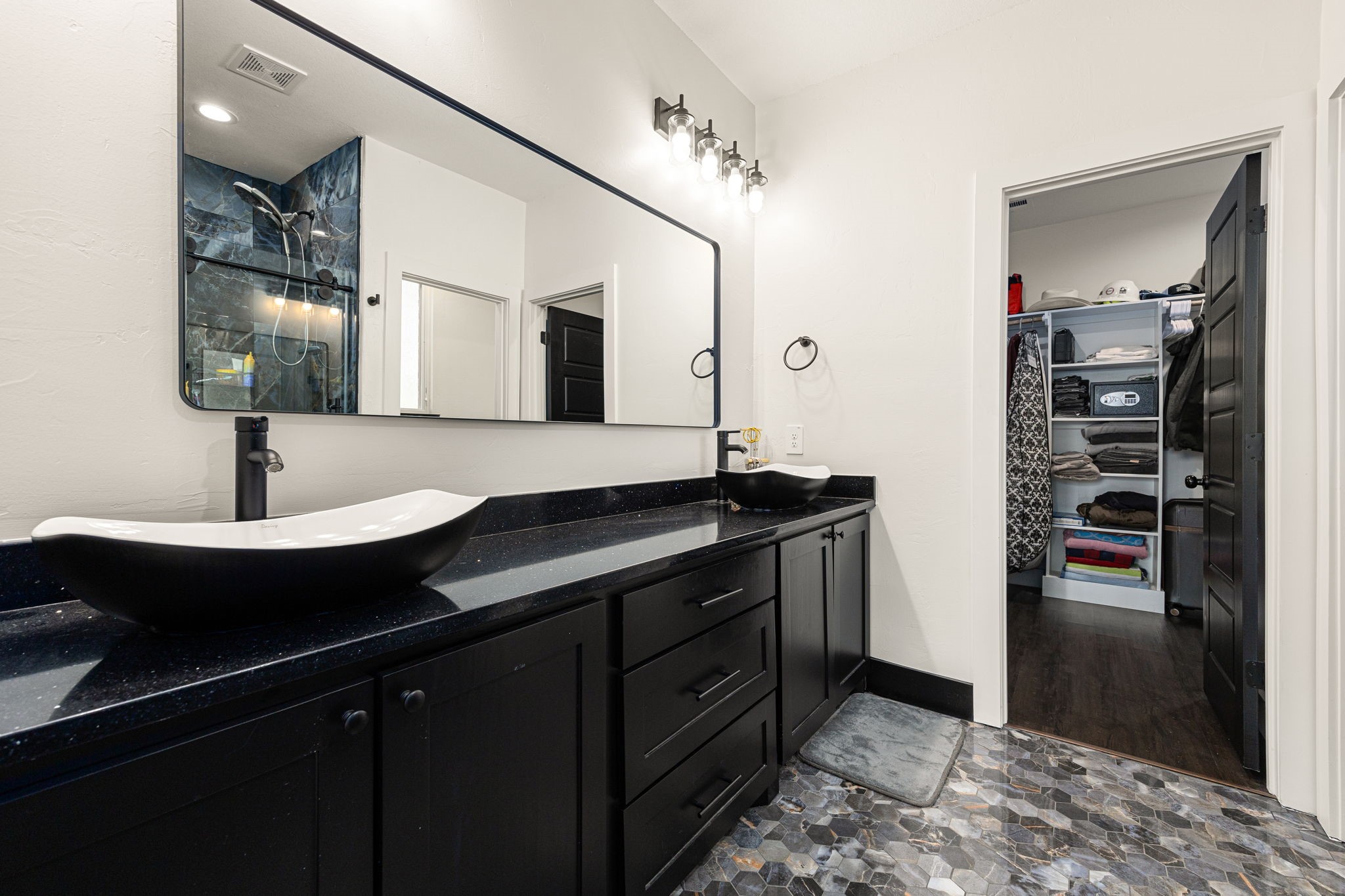24571 Armagh Road Hempstead, TX 77445 - Photo 25 of 45 a kitchen with a sink and refrigerator