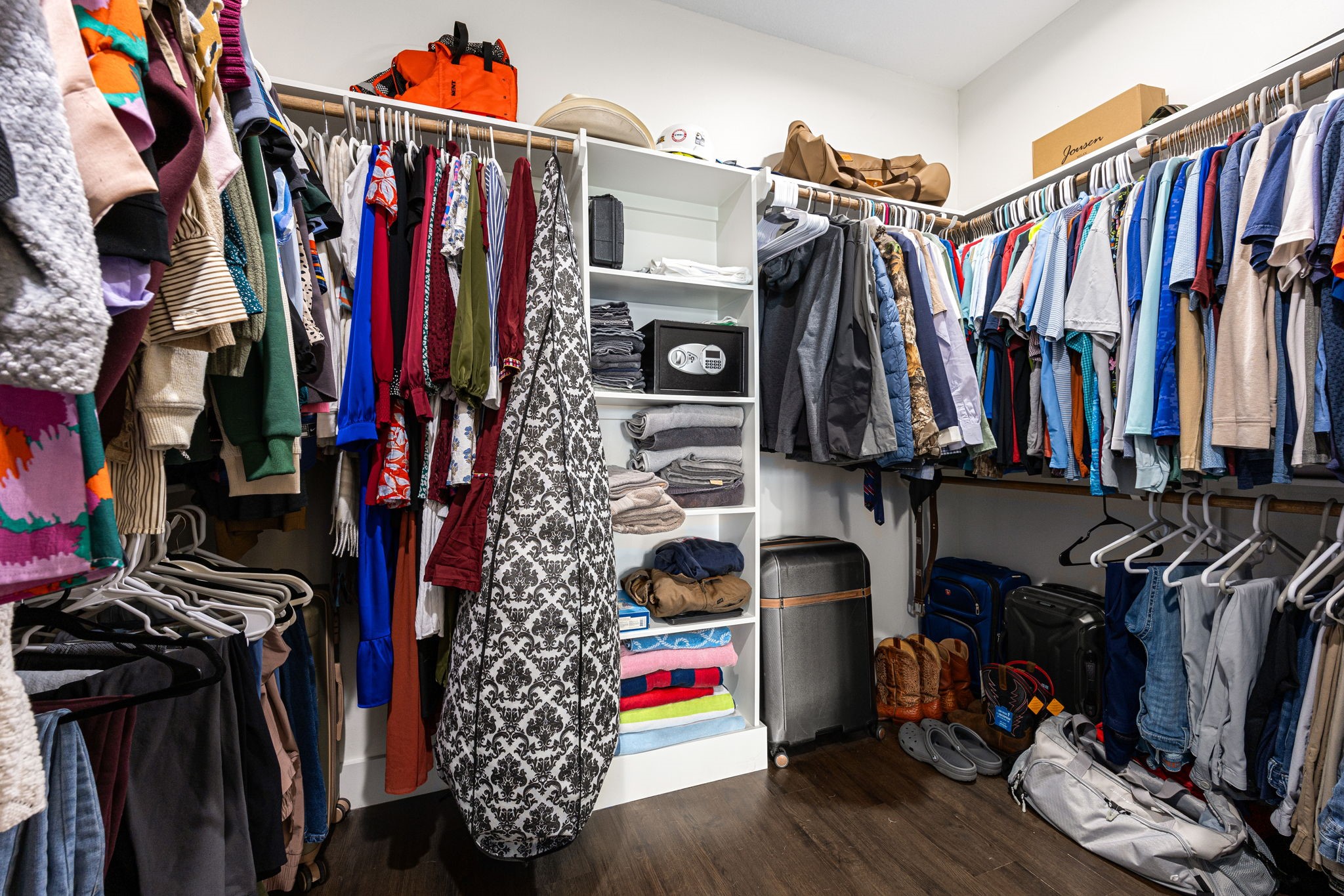 24571 Armagh Road Hempstead, TX 77445 - Photo 27 of 45 a view of walk in closet with clothes and shoes