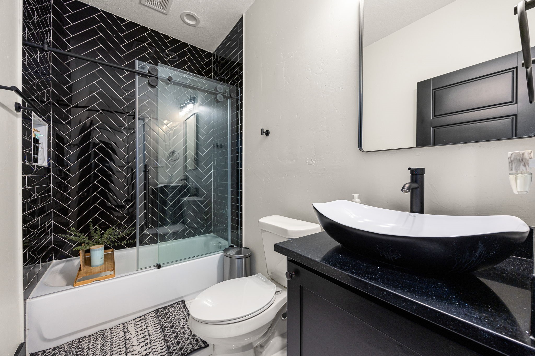 24571 Armagh Road Hempstead, TX 77445 - Photo 33 of 45 a bathroom with a sink toilet a mirror and shower