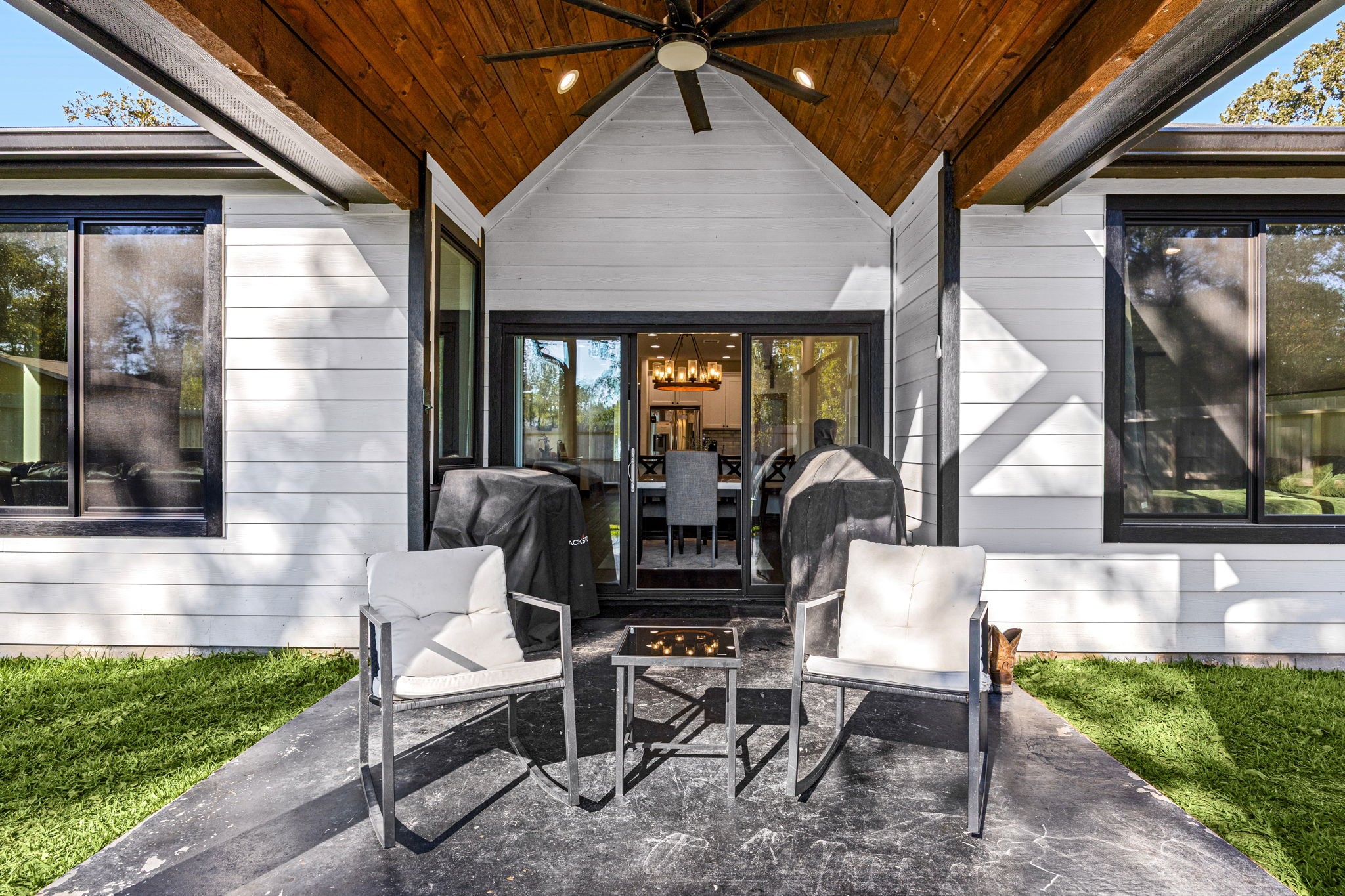 24571 Armagh Road Hempstead, TX 77445 - Photo 35 of 45 a view of a patio with table and chairs and potted plants