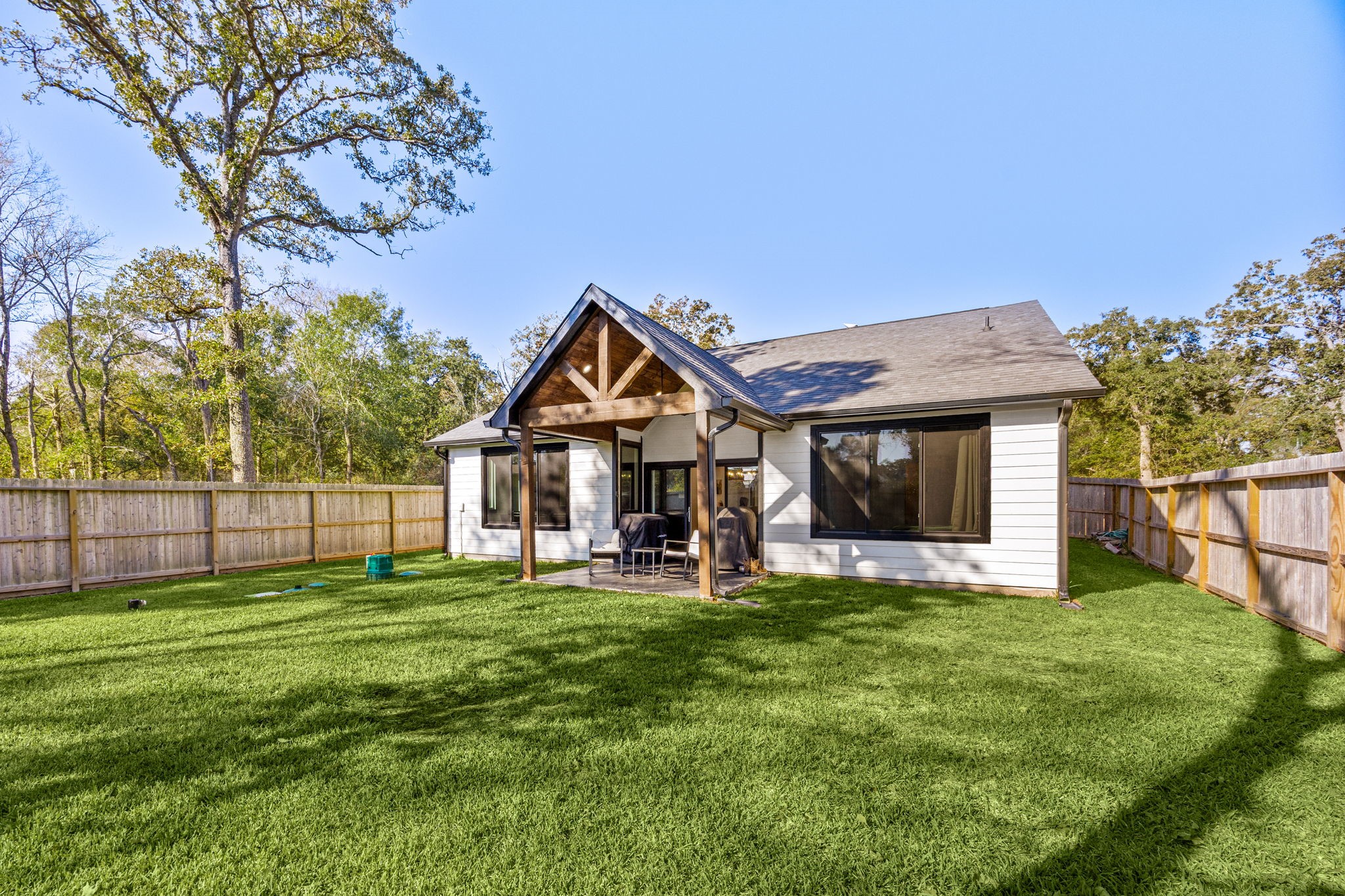 24571 Armagh Road Hempstead, TX 77445 - Photo 39 of 45 a front view of a house with a yard and garage