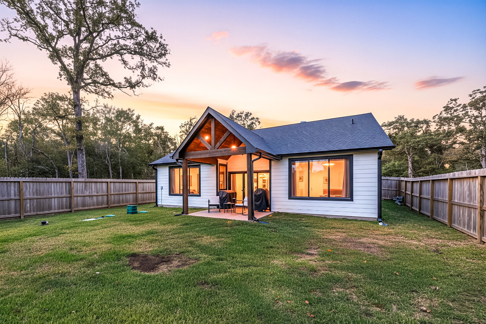 24571 Armagh Road Hempstead, TX 77445 - Photo 40 of 45 a view of a house with a yard and a garden