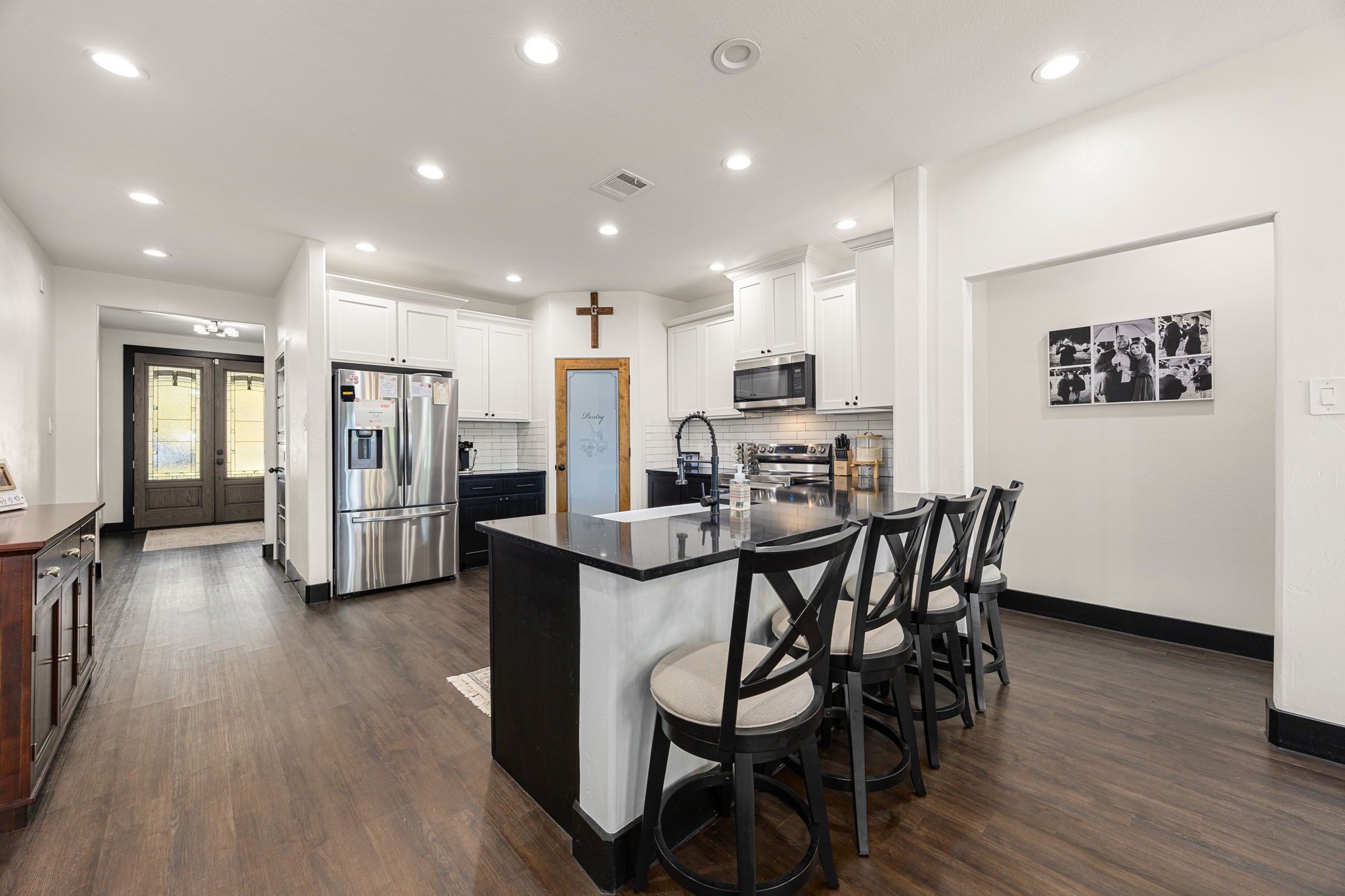 24571 Armagh Road Hempstead, TX 77445 - Photo 10 of 45 a view of a dining room with furniture and wooden floor