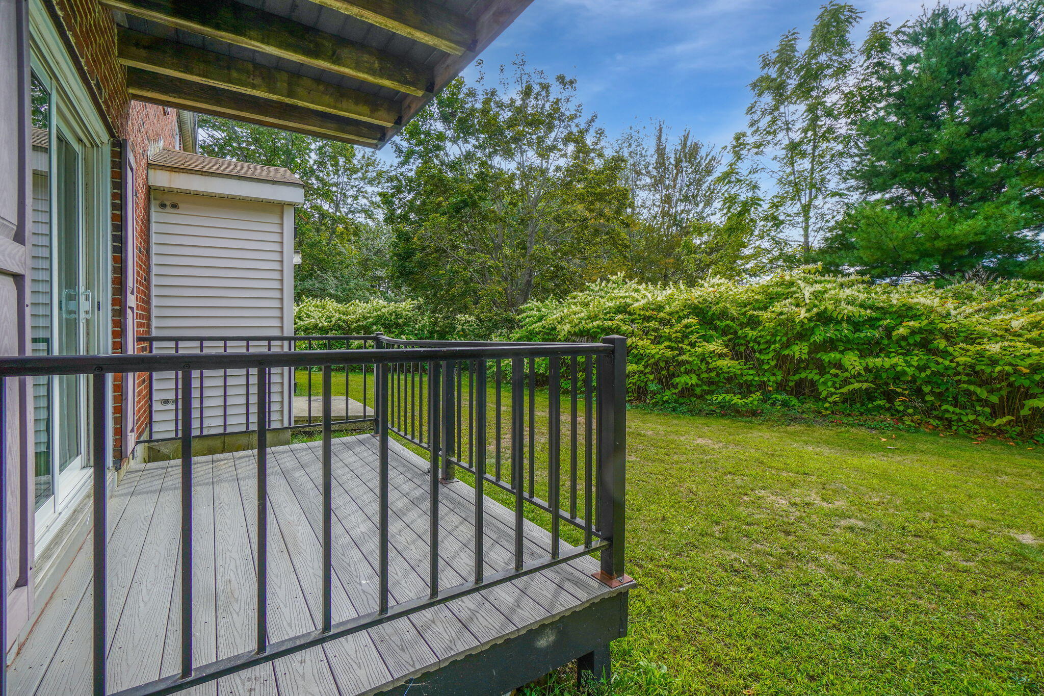4 Academy Place, Unit 3 Saco, ME 04072 - Photo 7 of 26 Grassy yard. Shrubs create privacy.