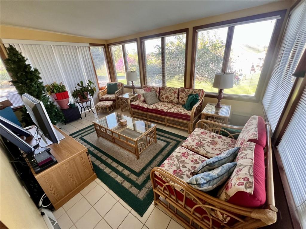 280 Derrick Avenue Uniontown, PA 15401 - Photo 23 of 28 a living room with furniture and a floor to ceiling window