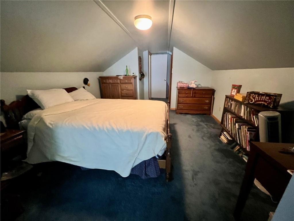 280 Derrick Avenue Uniontown, PA 15401 - Photo 25 of 28 a bedroom with bed and wooden floor