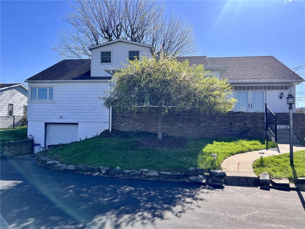 280 Derrick Avenue Uniontown, PA 15401 - Photo 28 of 28 a view of a house with a yard