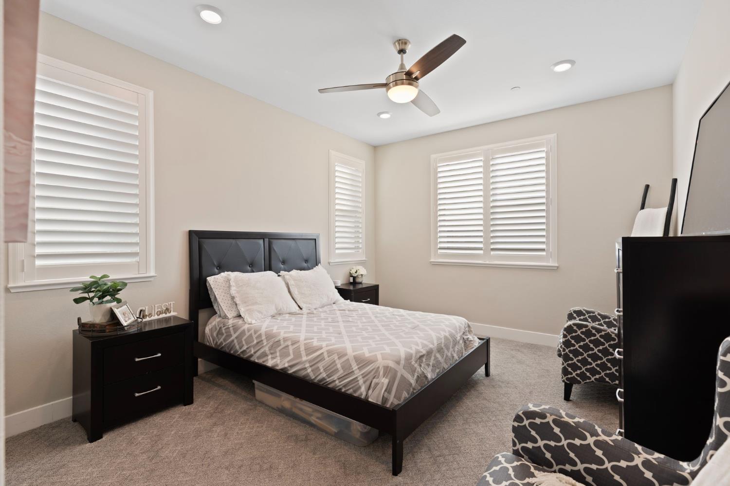 2948 Laredo Drive Rocklin, CA 95765 - Photo 23 of 54 a bedroom with a bed and a window