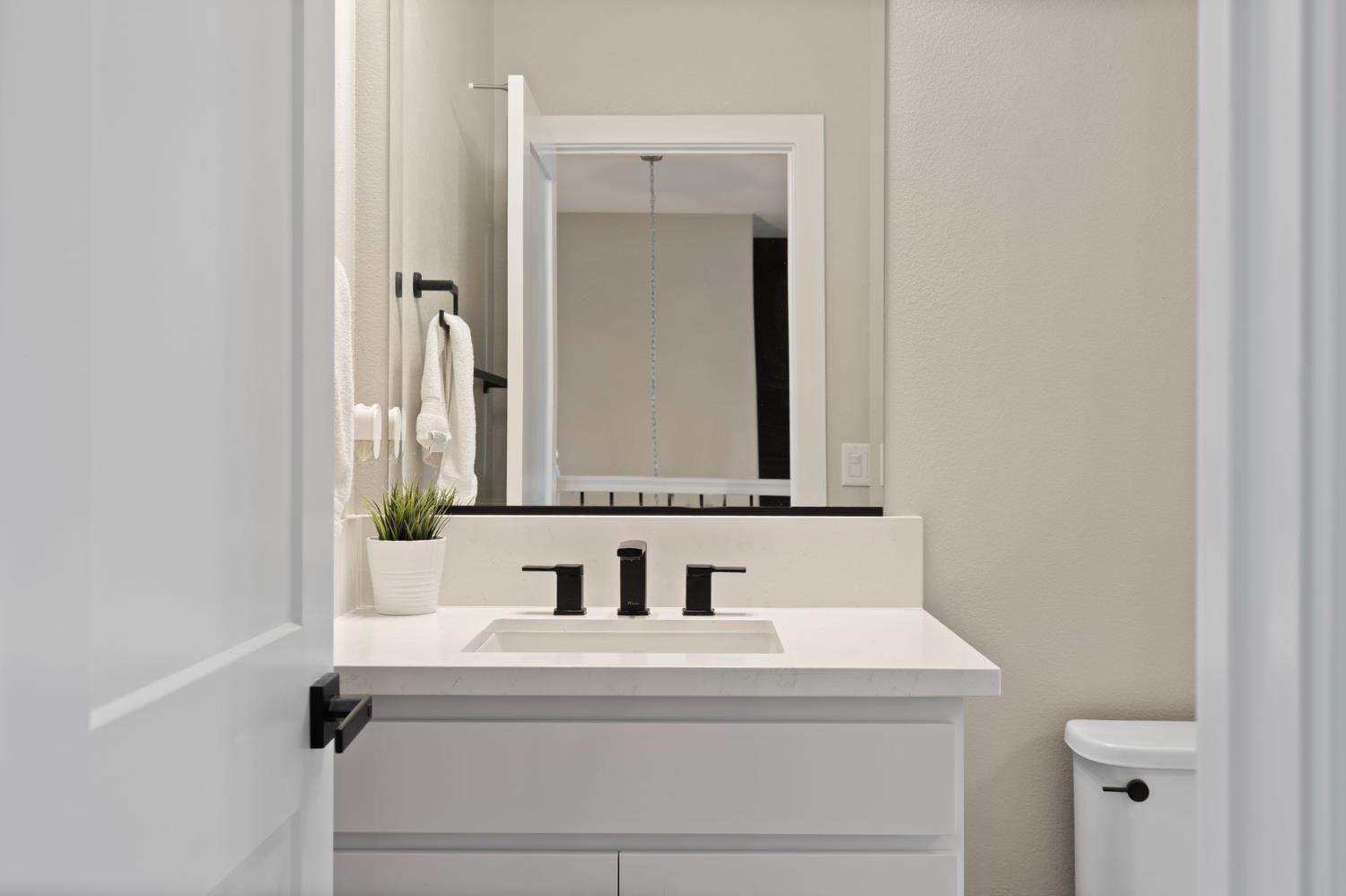 2948 Laredo Drive Rocklin, CA 95765 - Photo 36 of 54 a bathroom with a sink and a mirror