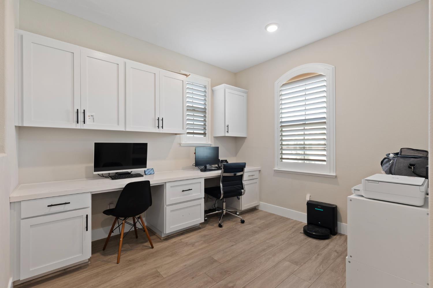 2948 Laredo Drive Rocklin, CA 95765 - Photo 42 of 54 a view of a workspace with furniture and a window