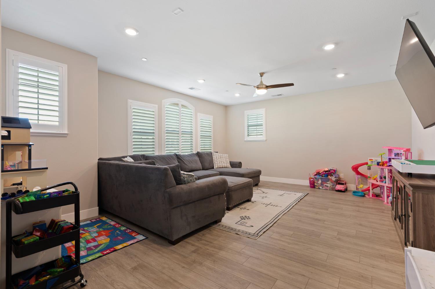 2948 Laredo Drive Rocklin, CA 95765 - Photo 43 of 54 a living room with furniture and a wooden floor