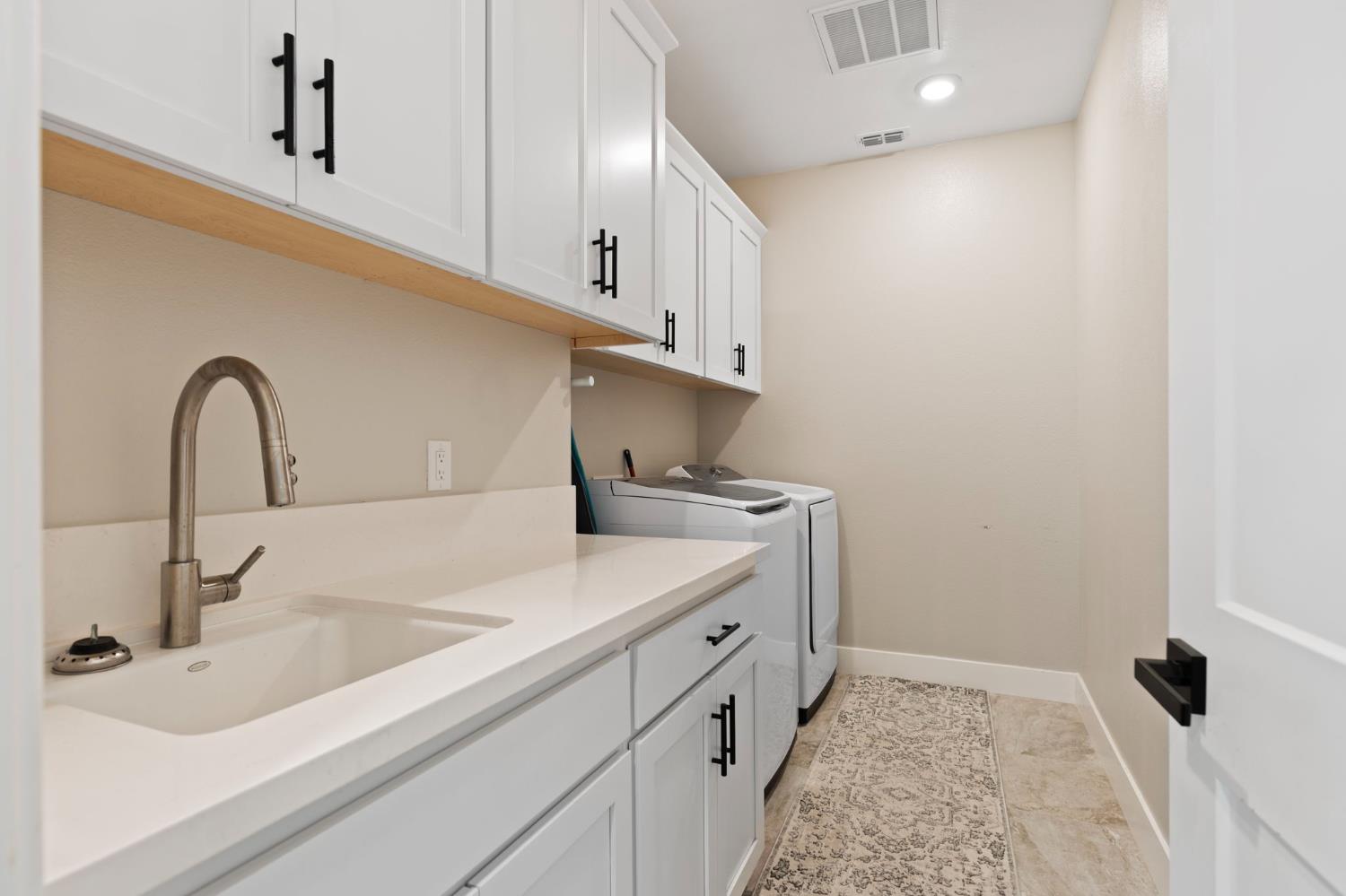 2948 Laredo Drive Rocklin, CA 95765 - Photo 45 of 54 a bathroom with a sink and a mirror