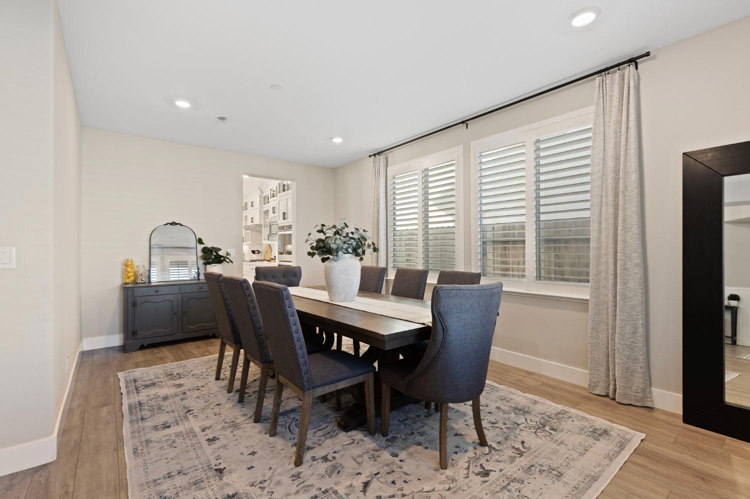 2948 Laredo Drive Rocklin, CA 95765 - Photo 7 of 54 a dining room with furniture and wooden floor