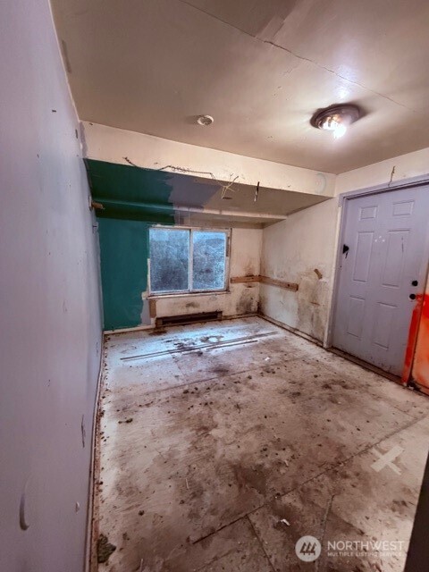 8915 10th Avenue South Seattle, WA 98108 - Photo 16 of 23 a view of a room with furniture and a window