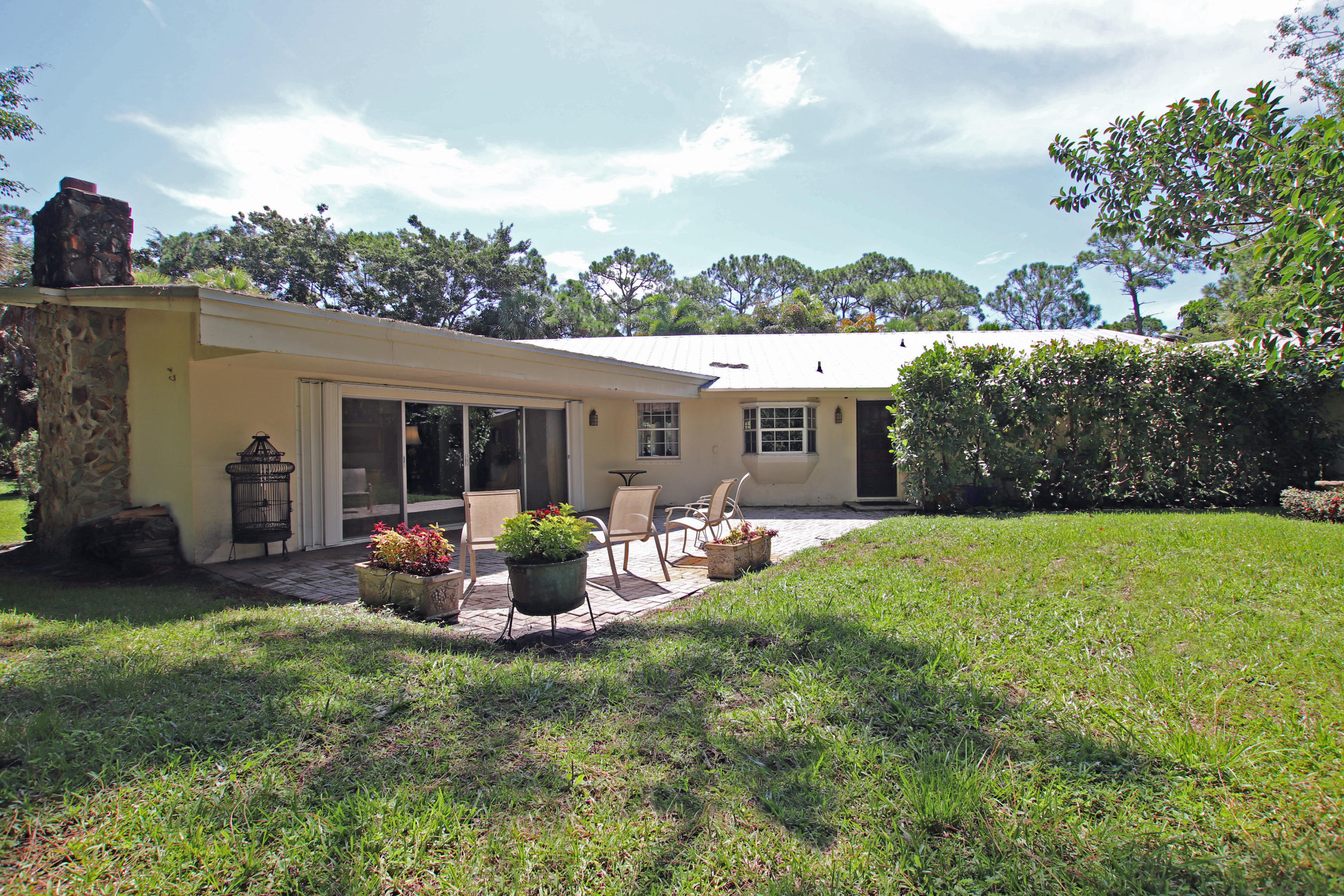 7689 Southeast Rivers Edge Street Jupiter, FL 33458 - Photo 6 of 41 Back exterior of home