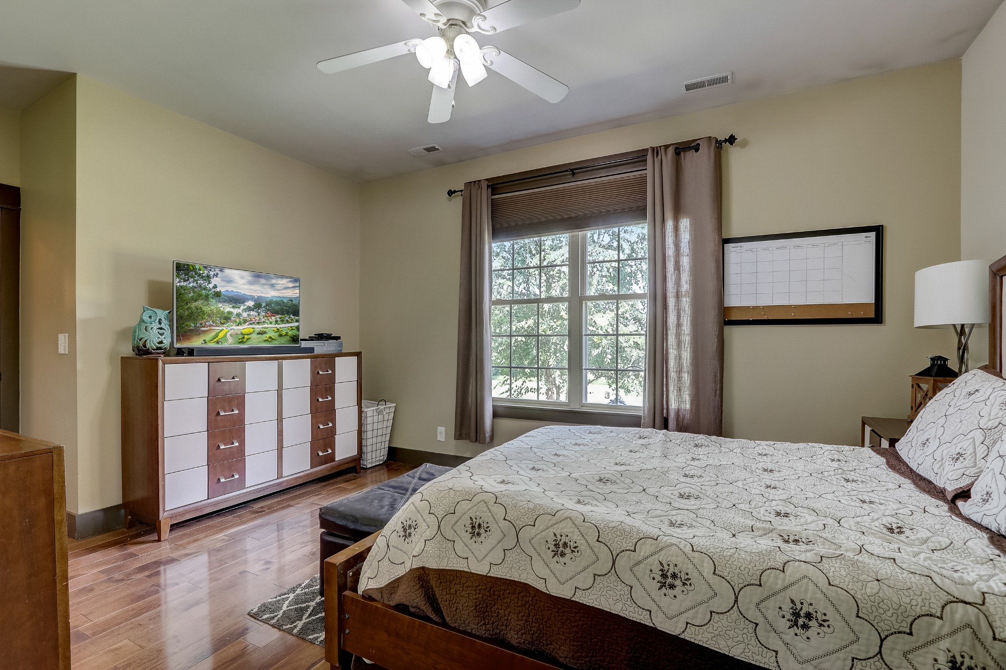 6745 Lovel Cook Road Springfield, TN 37172 - Photo 18 of 45 a bedroom with a large bed and a window