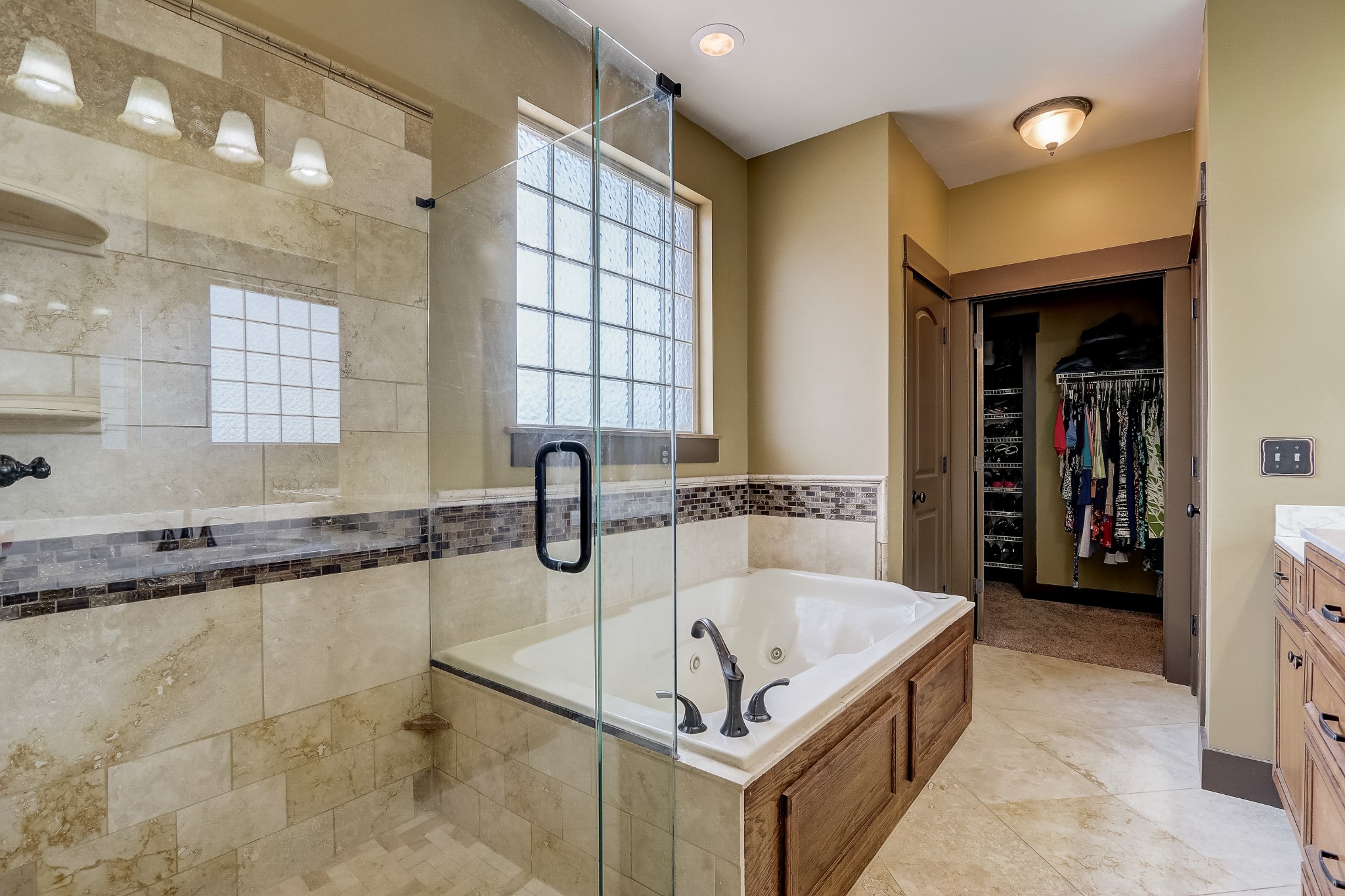 6745 Lovel Cook Road Springfield, TN 37172 - Photo 27 of 45 a bathroom with a tub a sink and a large mirror