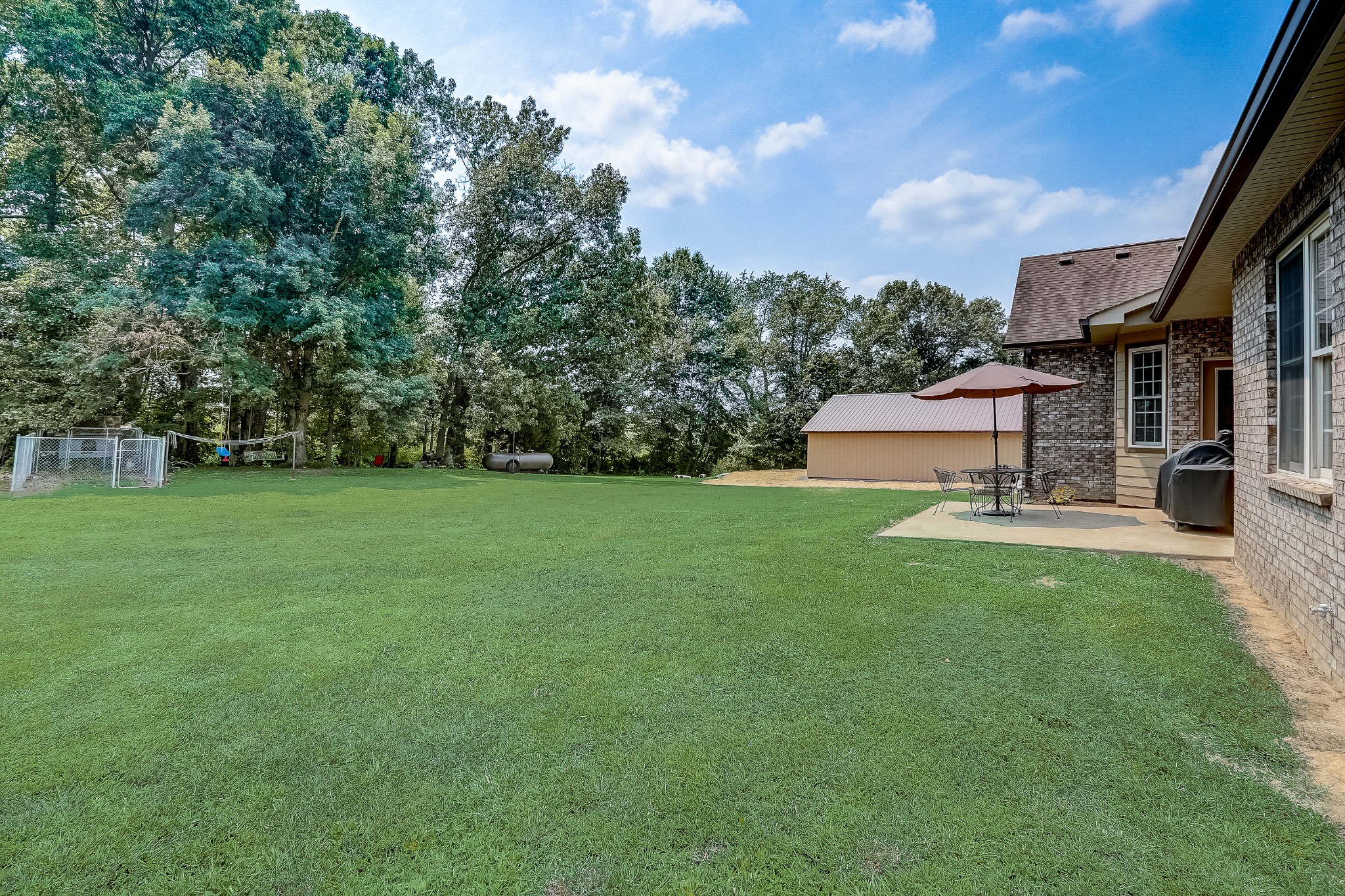 6745 Lovel Cook Road Springfield, TN 37172 - Photo 37 of 45 a view of a garden with a bench