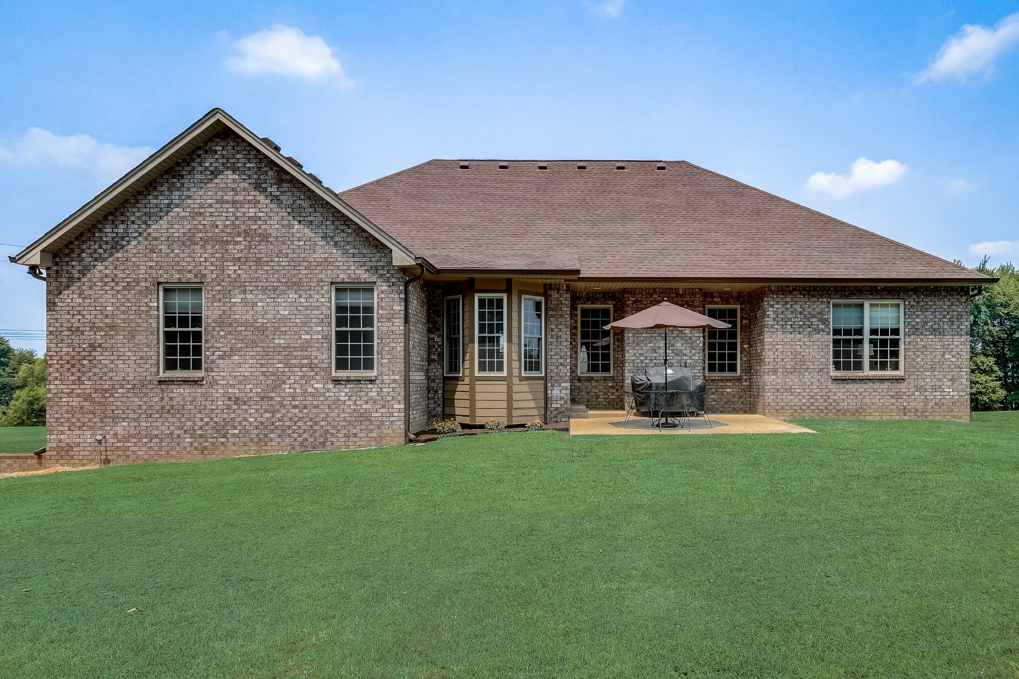 6745 Lovel Cook Road Springfield, TN 37172 - Photo 38 of 45 a front view of a house with a garden and porch