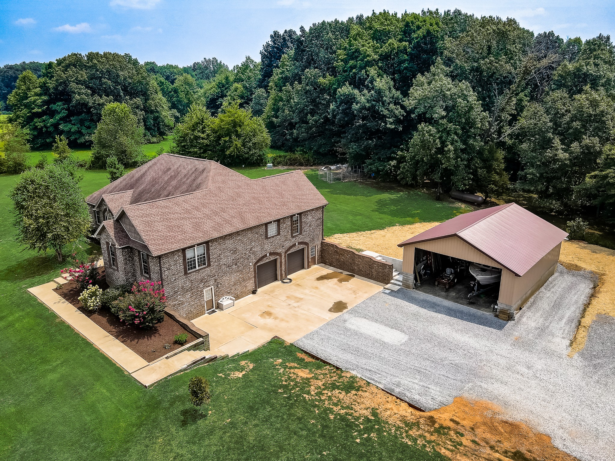 6745 Lovel Cook Road Springfield, TN 37172 - Photo 43 of 45 an aerial view of a house with garden space and trees