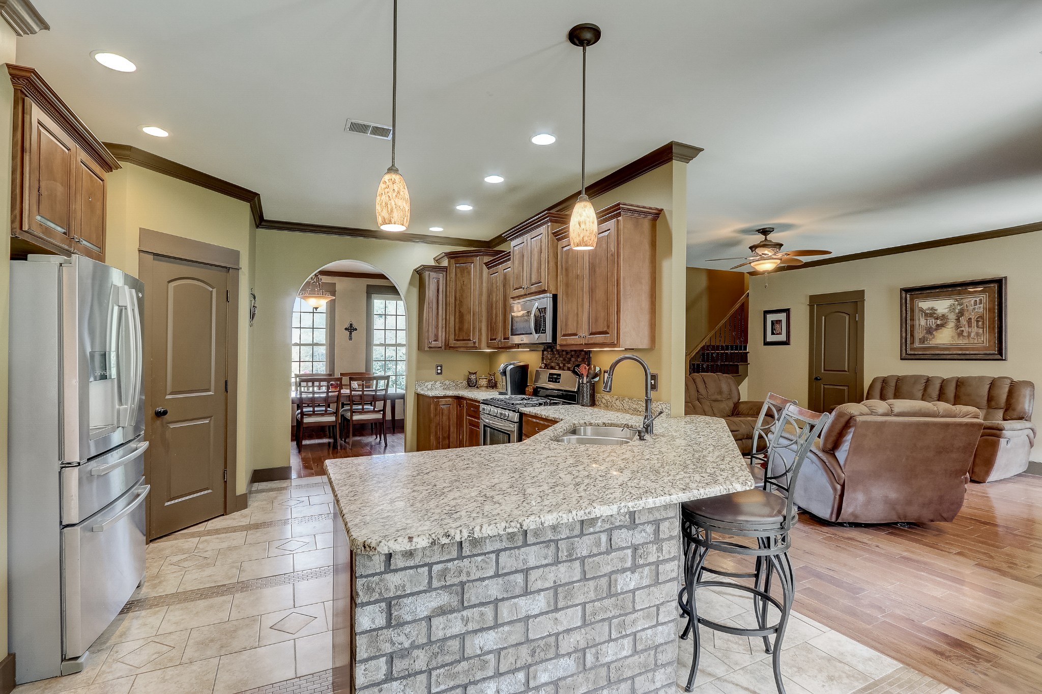 6745 Lovel Cook Road Springfield, TN 37172 - Photo 8 of 45 a view of kitchen and dining area with chandelier