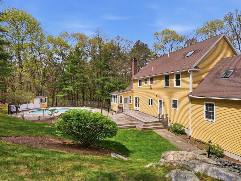 10 Hawk Ridge Road Andover, MA 01810 - Photo 32 of 32 a view of a house with backyard and sitting area