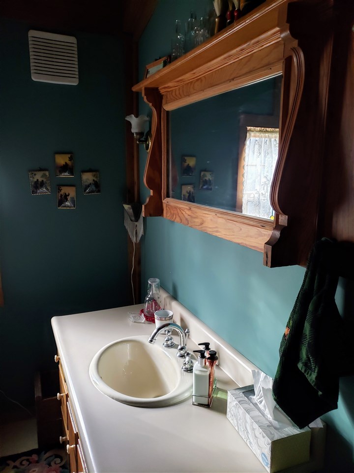 539 Purple Cow Road Waynesboro, VA 22980 - Photo 20 of 25 a bathroom with a sink and mirror