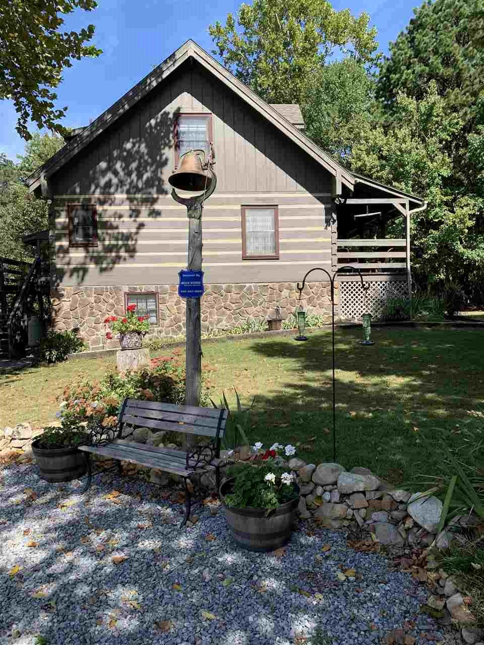 539 Purple Cow Road Waynesboro, VA 22980 - Photo 2 of 25 a front view of a house with garden