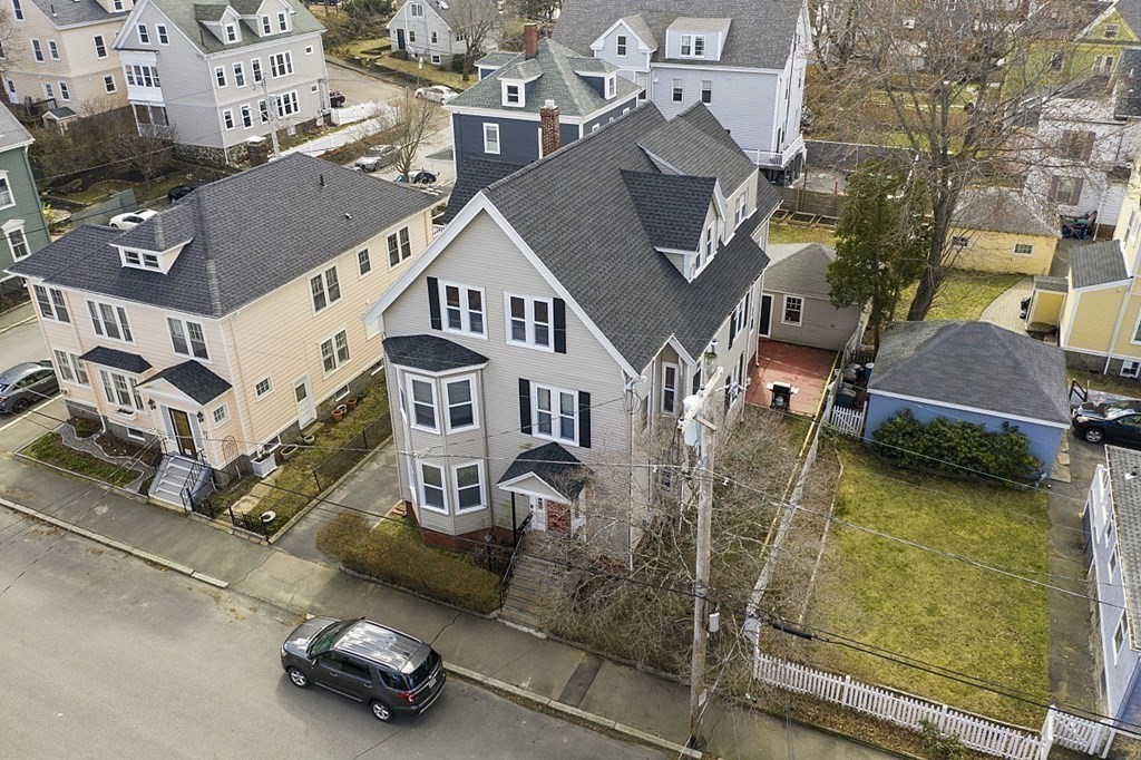 29 Ocean Avenue, Unit 4 Salem, MA 01970 - Photo 27 of 32 an aerial view of a house with swimming pool and large buildings