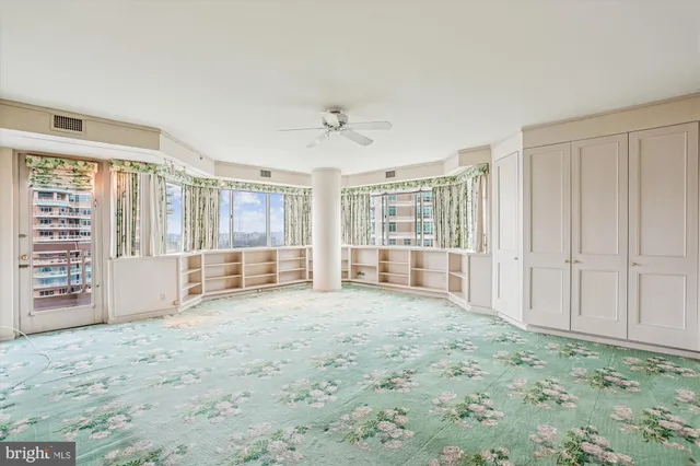 an empty room with windows