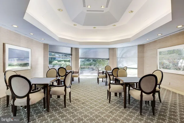 a view of a room with shelves and wooden floor