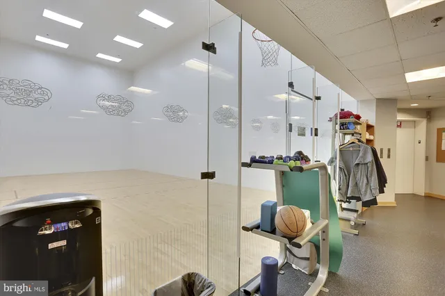 a view of a swimming pool with a yard