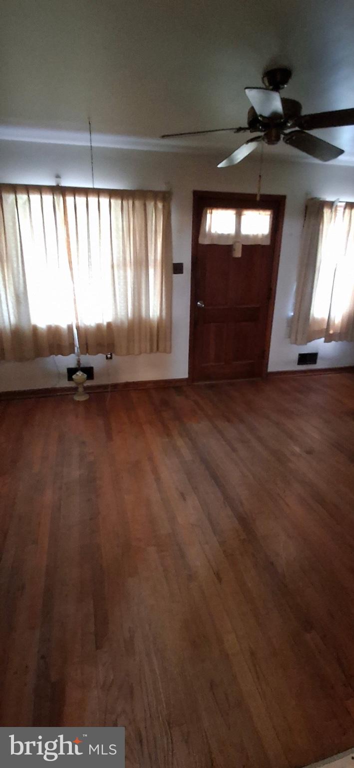 202 Holy Cross Road Brooklyn, MD 21225 - Photo 7 of 18 Spacious room with natural light.