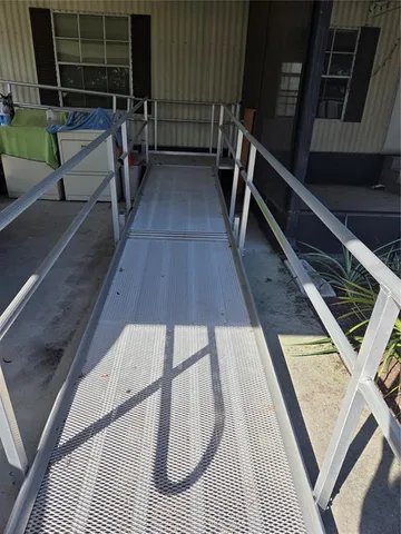 a view of balcony with wooden floor