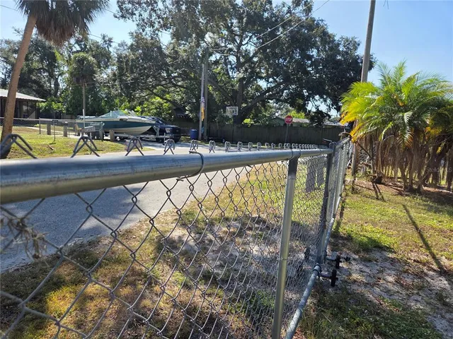a view of swimming pool from a lounge chair