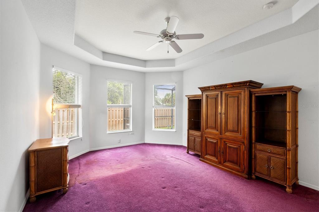 160 Wading Bird Drive Venice, FL 34292 - Photo 29 of 47 a livingroom with furniture window and a ceiling fan