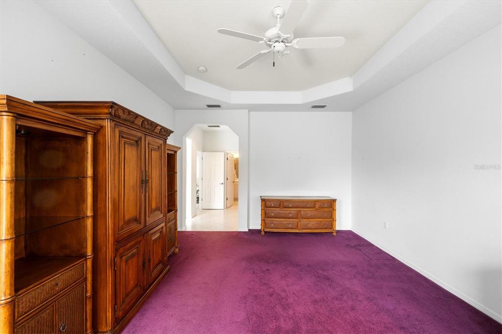 160 Wading Bird Drive Venice, FL 34292 - Photo 30 of 47 an empty room with windows and cabinet