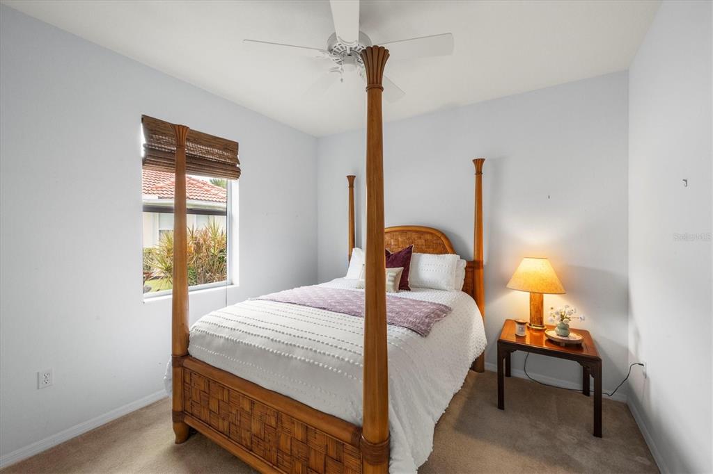 160 Wading Bird Drive Venice, FL 34292 - Photo 37 of 47 a bedroom with a bed and a window