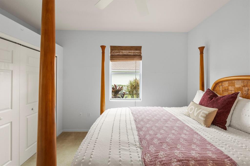 160 Wading Bird Drive Venice, FL 34292 - Photo 38 of 47 a bedroom with a bed and a window