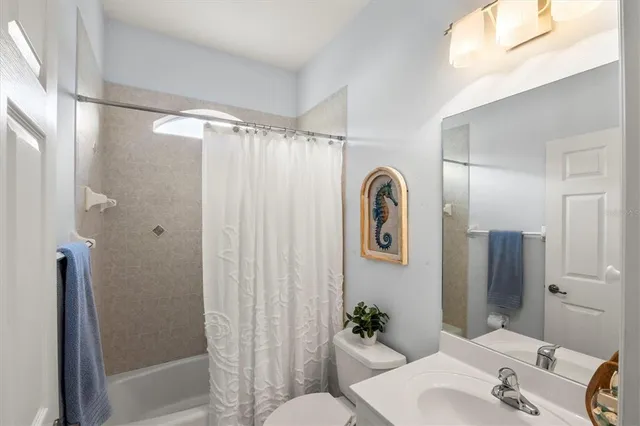 a living room with furniture and decor