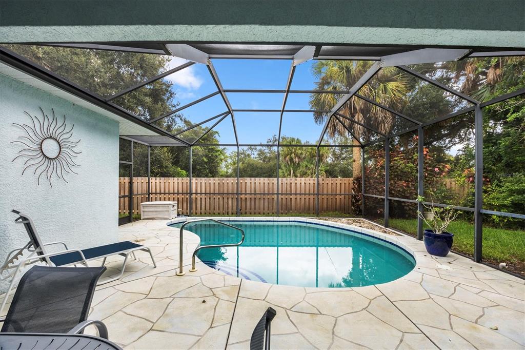 160 Wading Bird Drive Venice, FL 34292 - Photo 44 of 47 a view of a swimming pool with a patio
