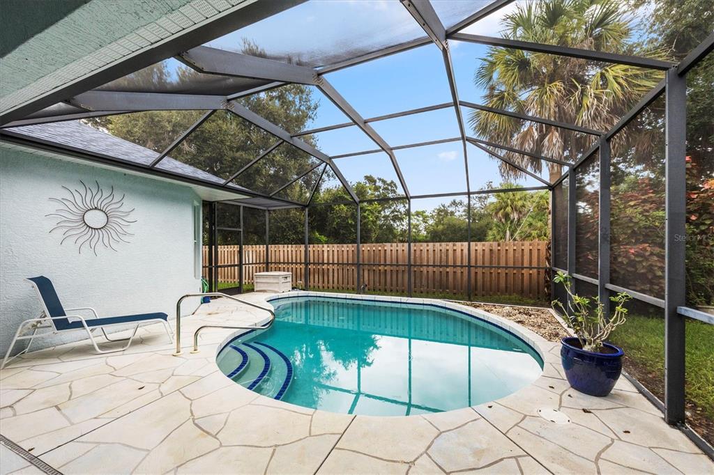 160 Wading Bird Drive Venice, FL 34292 - Photo 45 of 47 a view of a swimming pool with a patio