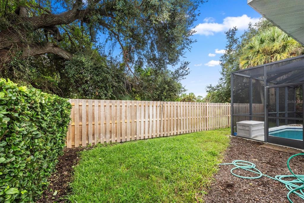 160 Wading Bird Drive Venice, FL 34292 - Photo 46 of 47 a fence of a house with a garden