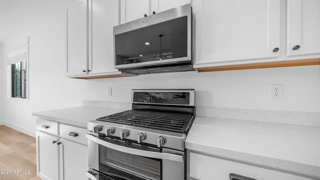 a bathroom with a sink and a shower