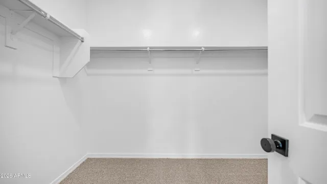 a view of a house with backyard and garden