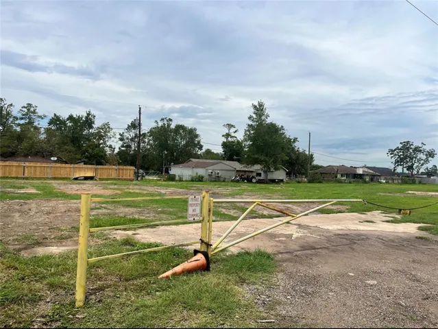 a view of a playground with basketball court