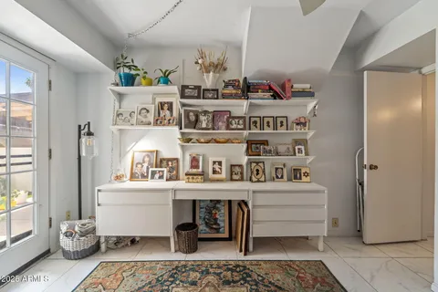 a living room with furniture and window