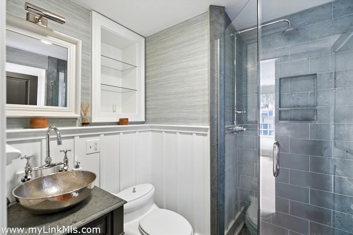 32 Union Street Nantucket, MA 02554 - Photo 13 of 30 a bathroom with a sink toilet and shower
